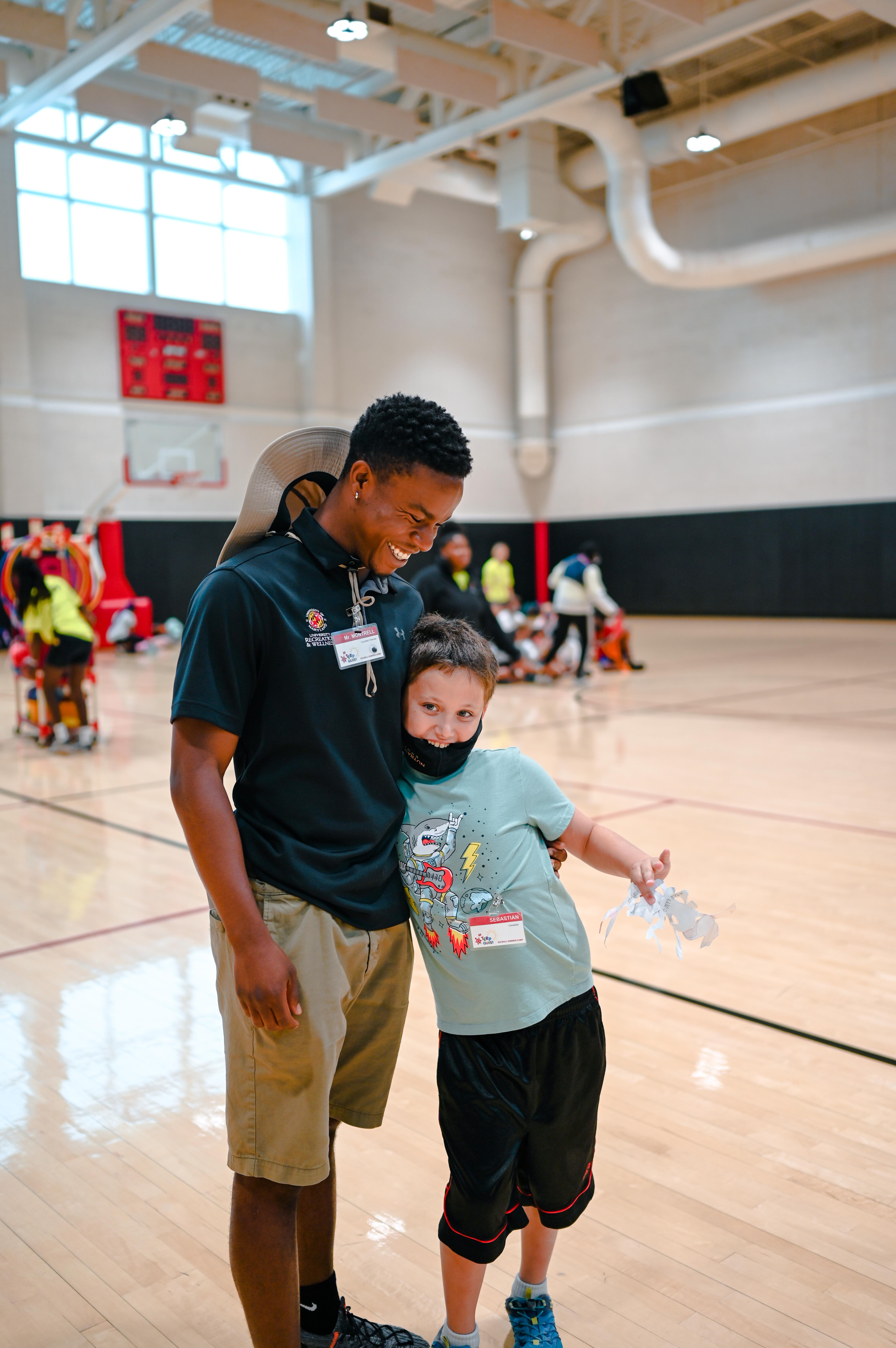 montrell hugging camp counselor